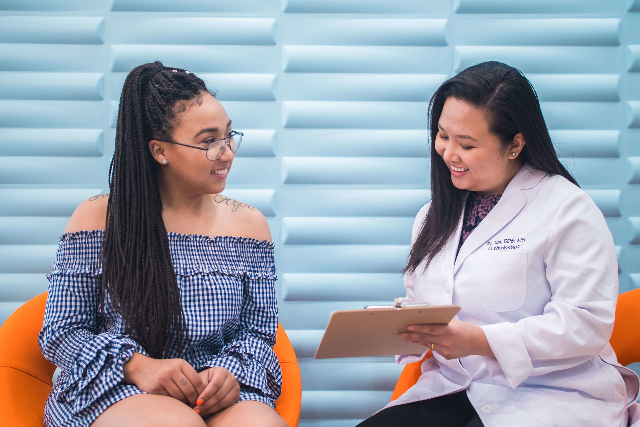 Dr. Tun meeting with an orthodontics patient