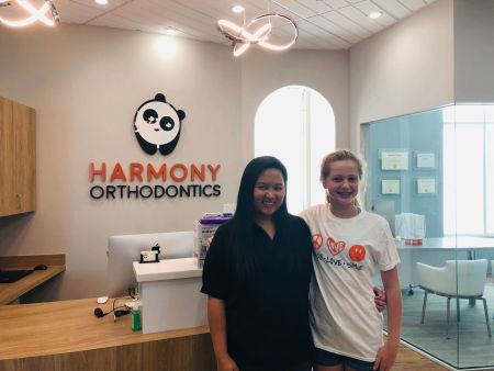 orthodontist with her patient with braces