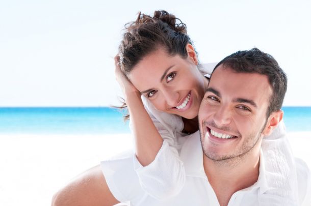 happy couple on the beach