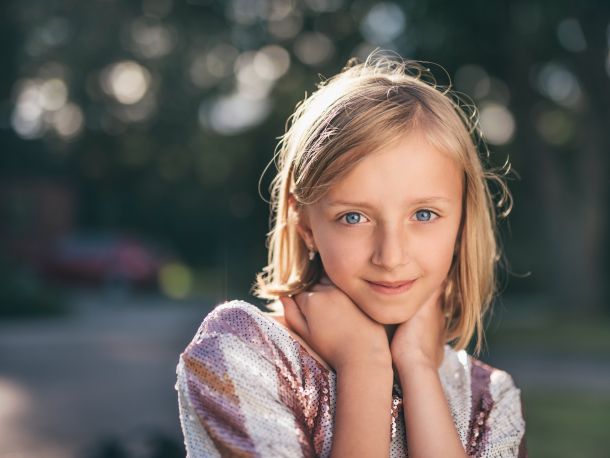 Blonde girl wearing a sequined top