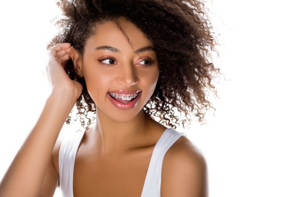 portrait of african american woman with braces